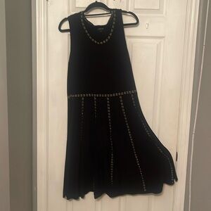 Black dress with gold embroidered detail